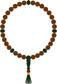 Traditional Islamic brown prayer beads with dark green decorative elements and a hanging tassel for spiritual meditation zikr and religious prayers during Ramadan.