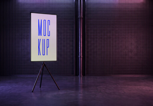 Vertical digital screen billboard mockup on a tripod stand against a grid wall with purple neon lighting in a futuristic studio
