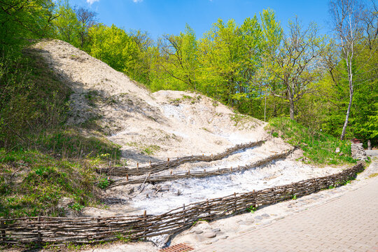 White salt terraces on hillside near Bear Lake in Sovata, Romania