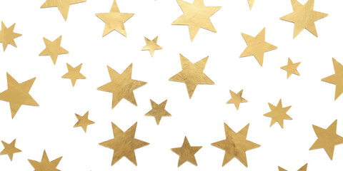 Obraz premium Shiny gold star shapes scattered on a plain surface for festive holiday celebrations