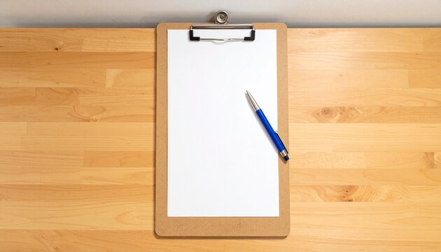 Top View of a Wooden Clipboard with Blank White Paper and a Blue Pen on a Desk