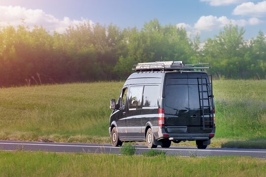 Contractor van driving to residential service calls