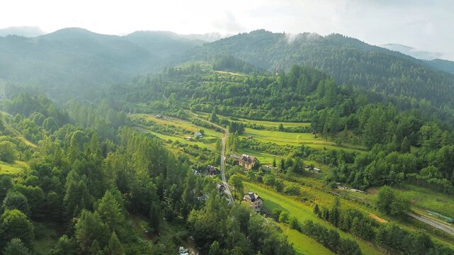 Tranquil mountain valley with red-roof houses