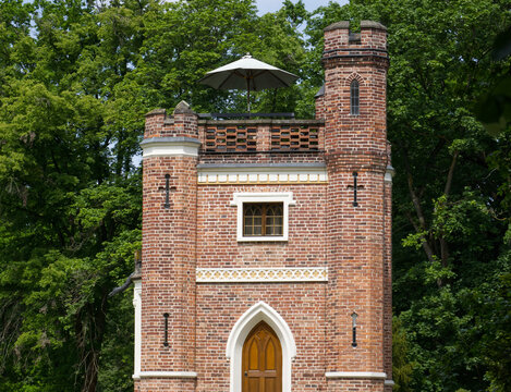 Dessau, Germany  05.24.2026Historical neogothic red brick tower building in park
