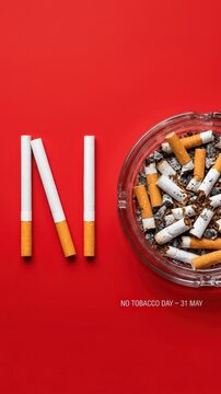 Cigarette butts in ashtray forming word no on red background, anti-smoking awareness, world no tobacco day health message, stop smoking concept, quit smoking campaign, ashtray filled with cigarettes