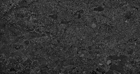 Fototapeta premium Dark, grainy texture covers entire image frame. Fine specks create subtle depth and contrast. Monochrome background suits graphic design needs. Ideal for digital art and print materials
