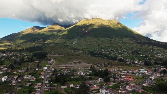 Majestic aerial view of the imbabura volcano with clouds moving over its peak in ecuador