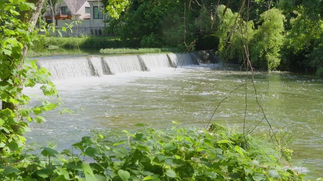 Water flowing over small Texas river dam