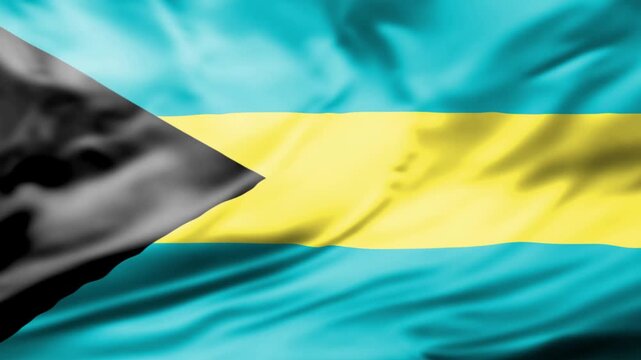 Waving National Flag of Bahamas in Windy Ocean Setting with Vibrant Blue Background
