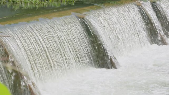 Water flowing over small Texas river dam