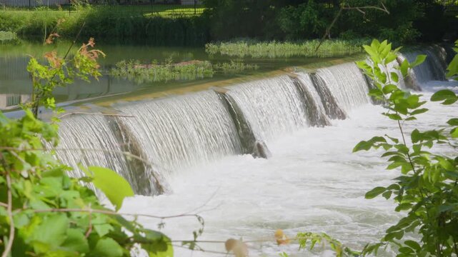 Water flowing over small Texas river dam