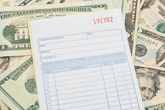 Blank invoice on twenty dollar bills for business transactions and invoicing