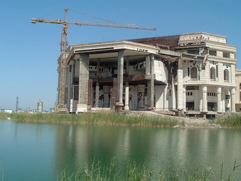 Crane over an unfinished Republican Guard palace on Victory Base in Baghdad, Iraq, during Operation Iraqi Freedom
