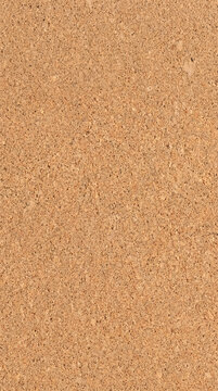 Natural agglomerated cork board texture with porous, grainy brown surface