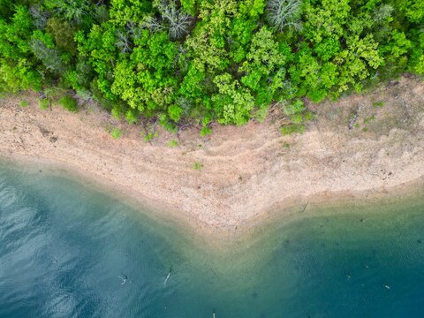 aerial view of uneven sandy coast