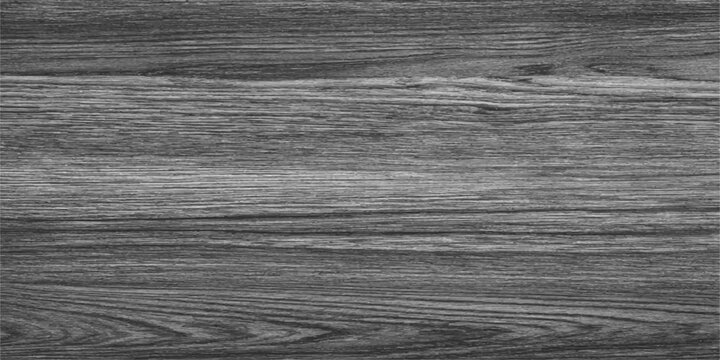 Close-up texture of dark gray wooden planks with visible grain, creating a rustic and natural background.