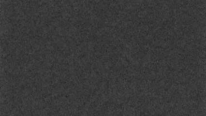 Fototapeta premium Dark gray textured desktop wallpaper with a subtle grainy style