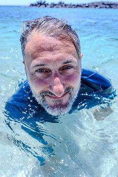 Face close up in ocean