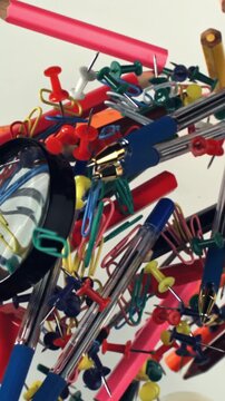 Different school tools fly up and down. Back to school. Filmed on a high-speed camera at 1000 fps. High quality FullHD footage