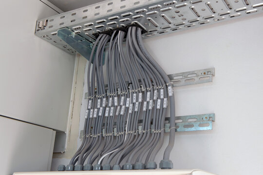 Cable management and electrical wiring system inside a solar power plant inverter station. 