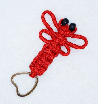 Crafted key ring made of red Paracord, Germany