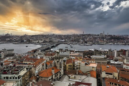 Panoramic view from the Galata Tower on the sea of houses at the Golden Horn, evening sky, Istanbul, Turkey