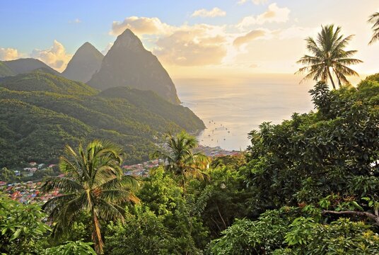 Tropical landscape with view of the village and the two Pitons, Gros Piton 770m and Petit Piton 743m, evening sun, Soufriere, St. Lucia, Lesser Antilles, West Indian Islands, Caribbean Sea