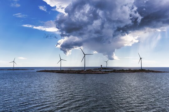Wind turbines on small islands, Lilla B&aring;tsk&auml;r and Stora B&aring;tsk&auml;r, wind turbine, wind farm in the archipelago, Smart Energy &Aring;land project, storm clouds, Mariehamn, &Aring;land Islands, Gulf of Bothnia, Baltic Sea, Finland