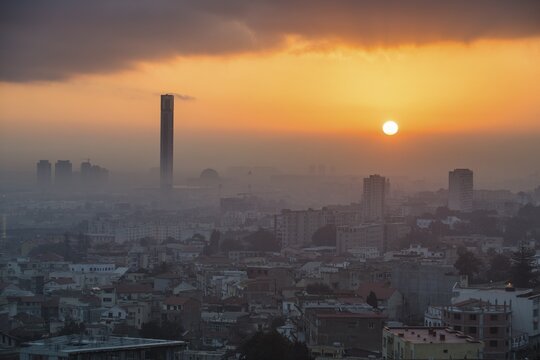 Sunrise over city with minaret of Great Mosque of Algiers, Algeria