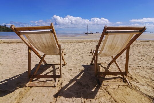 Sun loungers on the beach of Andilana, Island of Nosy Be, Madagascar, Indian Ocean