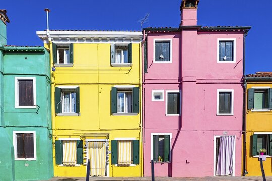 Colourful house facades in Burano, Burano Island, Venice, Veneto, Italy