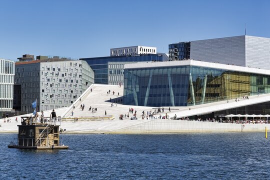 Sauna boat, floating sauna in front of the opera house in summer, Sn&oslash;hetta architecture office, modern architecture, Bj&oslash;rvika district, Oslofjord, Oslo, Norway
