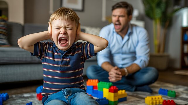  Angry autistic child covering ears during family conflict at home
