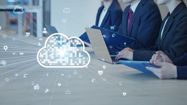 A group of male and female business professionals holding a meeting and the concept of a cloud network.