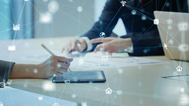 The concept of a group of male and female business professionals meeting in a digital network.