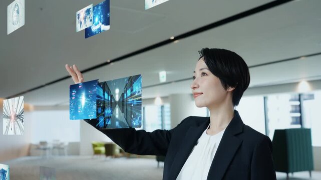オフィスで立体映像をを見る女性