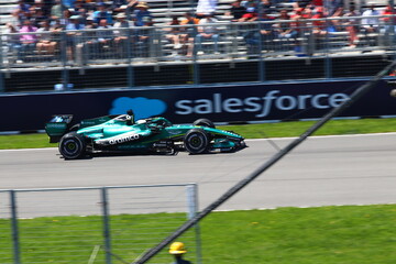 Obraz premium May 24, 2026, Montreal, Canada, Mercedes F1 car racing through Circuit Gilles Villeneuve corner. g.