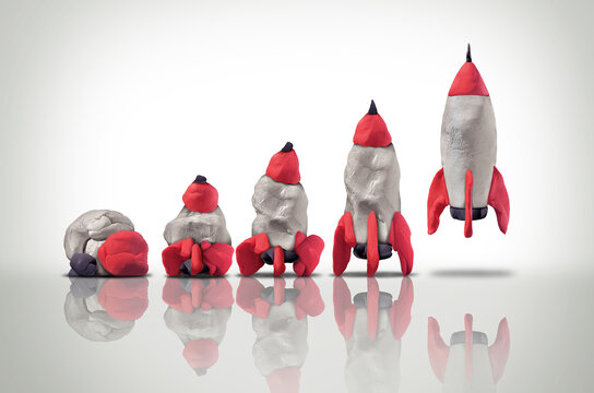 A symbolic clay rocket gradually shaped by human hands representing transformation growth ambition and the creative development and journey from raw potential to success.