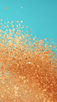 Cane sugar soars against a blue background. Filmed on a high-speed camera at 1000 fps. High quality FullHD footage