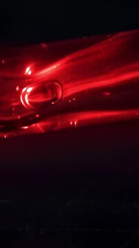 A test tube with blood falls on the medical table. Filmed on a high-speed camera at 1000 fps. High quality FullHD footage