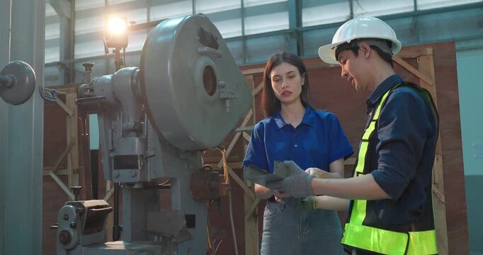 Engineer Demonstrates Product Testing Machine to Startup Entrepreneur in Small Lab Workshop