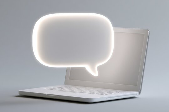 Single speech bubble above laptop as clear message concept