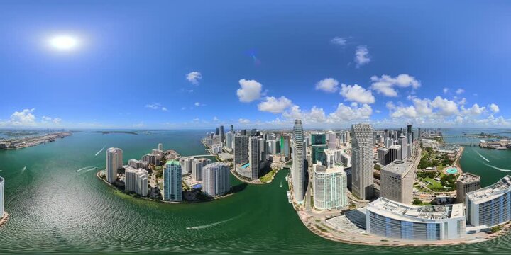 Aerial 360 stock video Downtown Miami by river scene