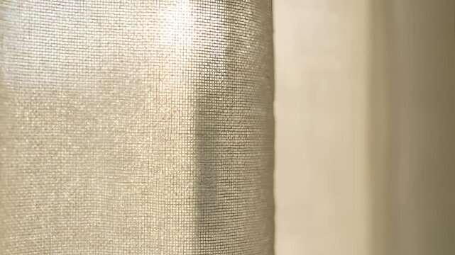 Closeup of textured fabric with soft lighting.