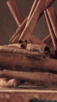 Cinnamon sticks fall on the table. Filmed on a high-speed camera at 1000 fps. High quality FullHD footage