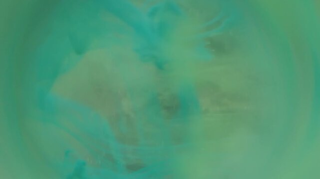 Blur mist blend. Paint vapor drop. Blue green pigment spilling in round prism tunnel background. Color abstract blob fog glow whirl.