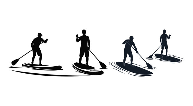 Black silhouettes of people standing on stand up paddle boards