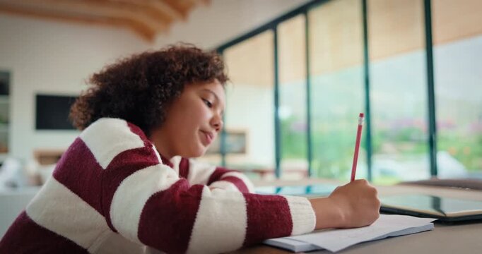 Child, writing and thinking in house with homework, education and knowledge with math assignment. Girl, notes and problem solving in home with notebook, study numeracy and learning development.