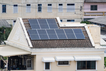 Fototapeta premium Harnessing solar cell technology rooftops a sustainable energy solution in urban environments