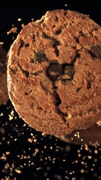 Oatmeal cookies fly up and fall down. Filmed on a high-speed camera at 1000 fps. High quality FullHD footage